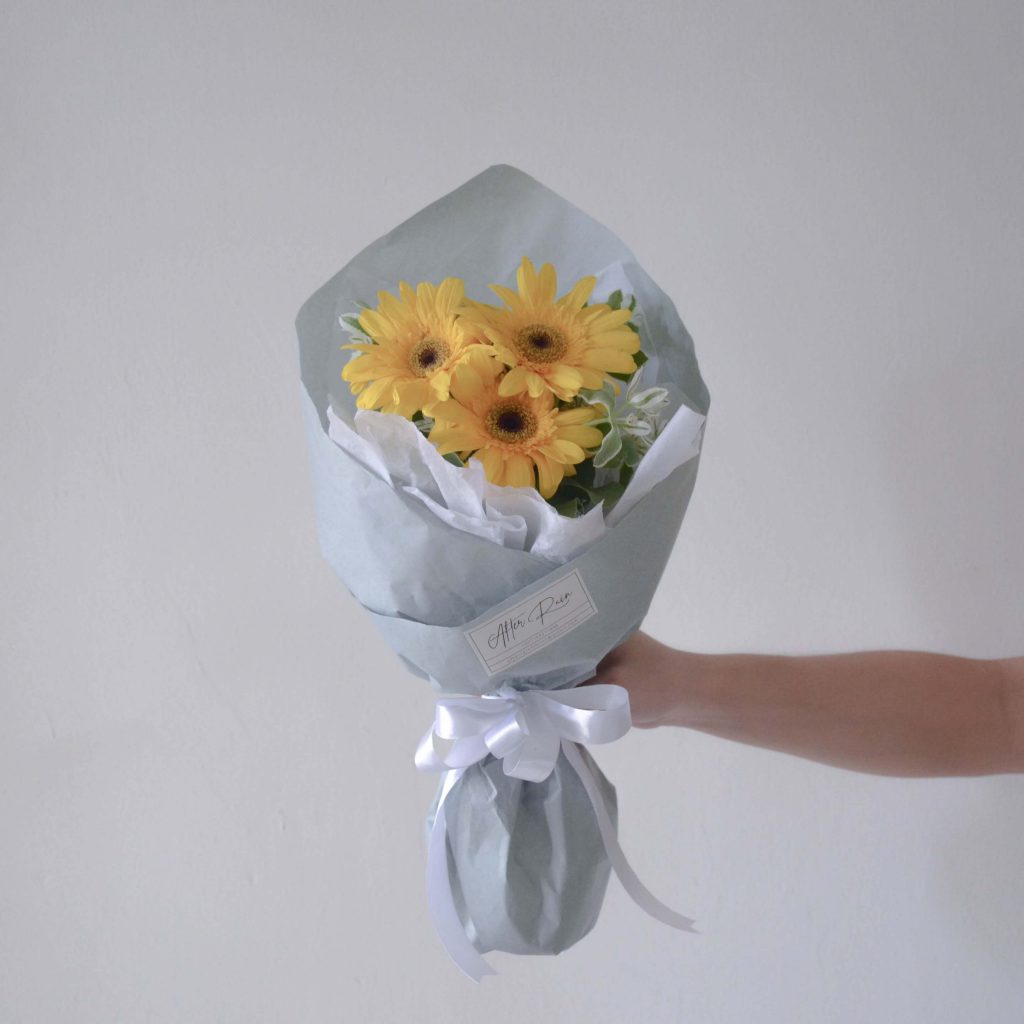 Yellow Gerbera with Variegated Euphorbia Marginata Leaf by AFTERRAINFLORIST