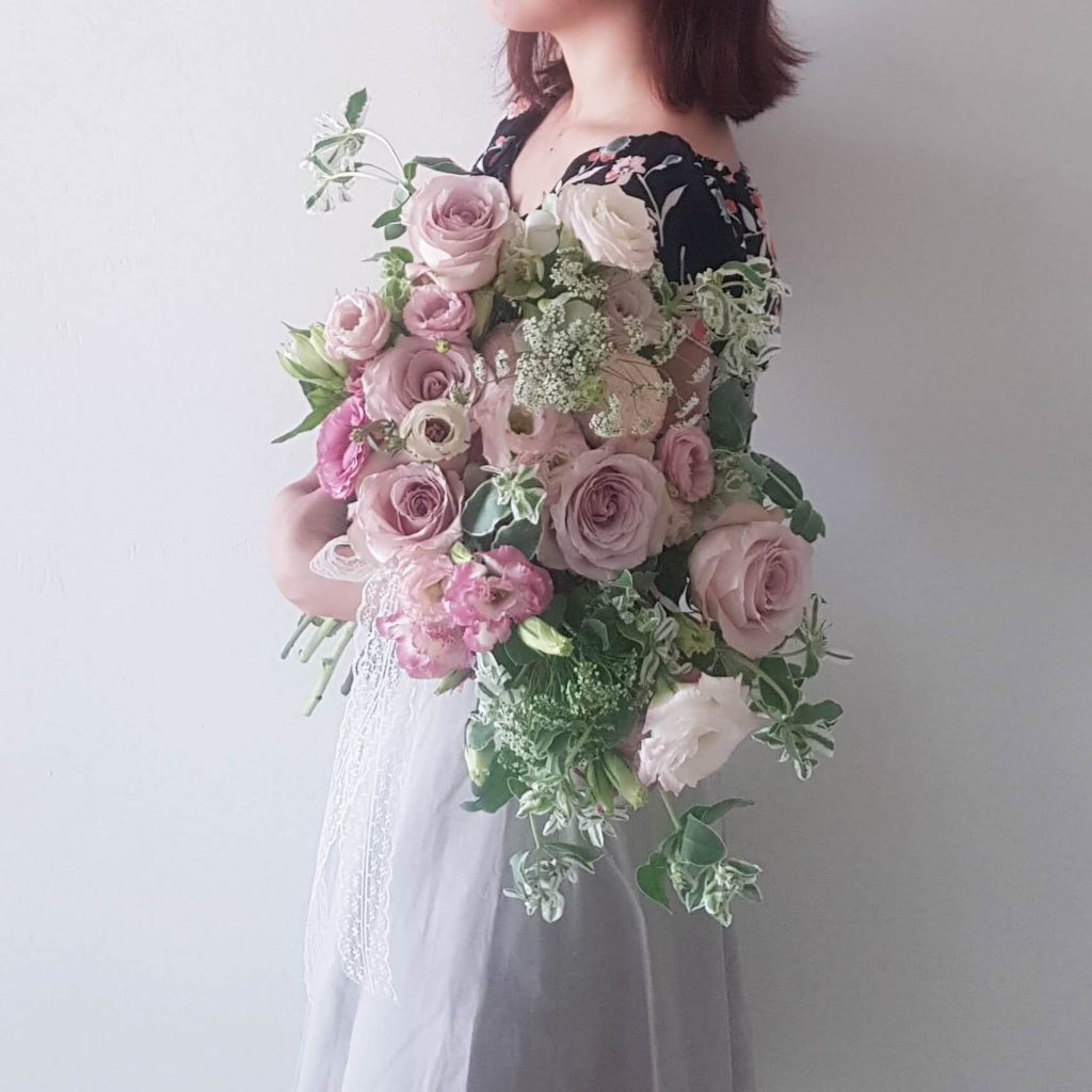 Elegant style hand-tied fresh bridal bouquet by AfterRainFlorist